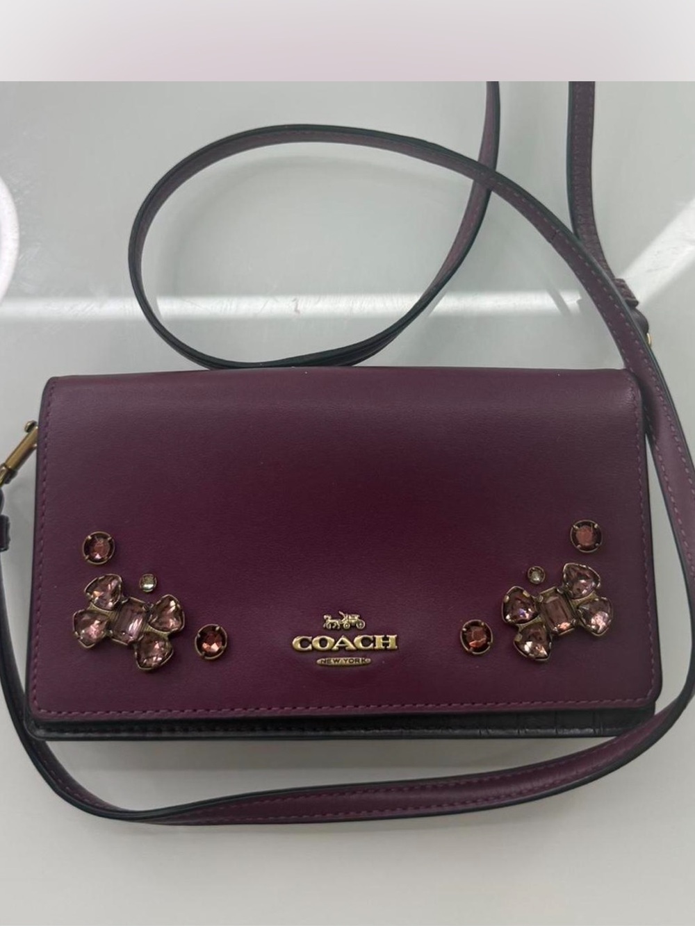 Coach Crystal Applique Slim Phone Crossbody (SN: 38932) refined calf leather.